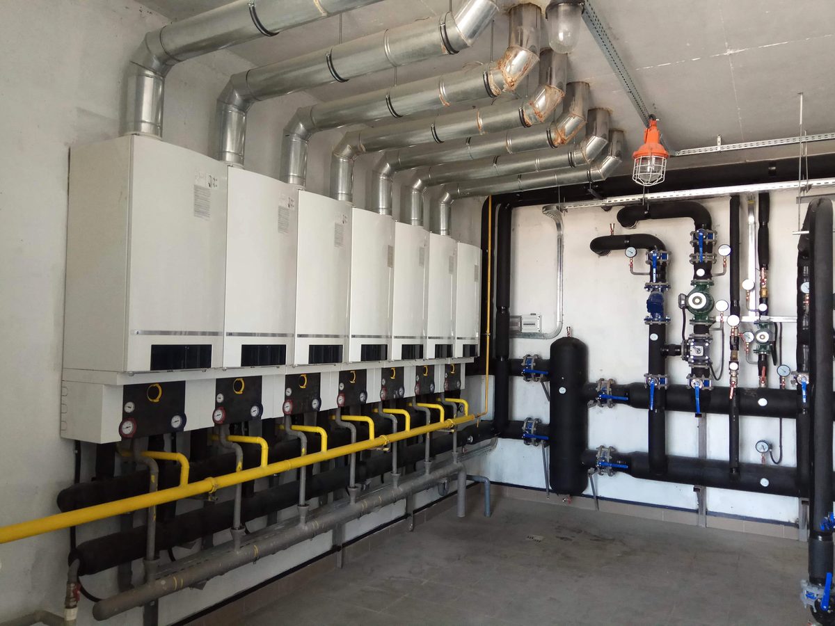 Pipework and pumps in a commercial plant room